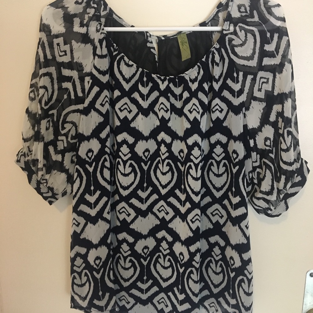 Navy and white patterned blouse